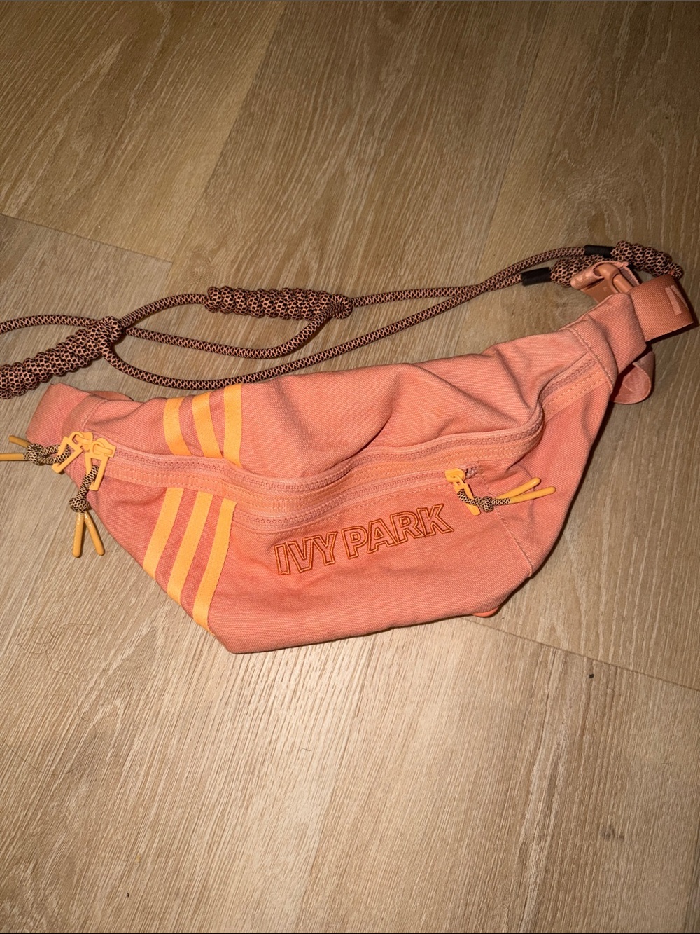 IVY PARK Coral Orange Crossbody Belt Bag with Yellow Accents